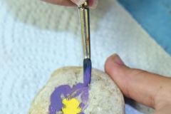 Each year, students will add to the collection of painted rocks.