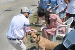 Casey Peissel proposes to Kelsey Maloney during the Pawleys Island Fourth of July Parade. Their families surprised the couple with a float in the parade, which won the prize for Most Original. She said 'Yes.'