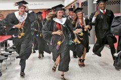 Seniors scramble to get in line for the procession at the start of the 27th Waccamaw High commencement on Wednesday. Photos by Tanya Ackerman/Coastal Observer
