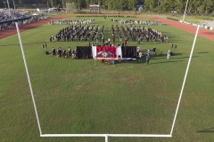 Graduates assemble on Warrior Field.